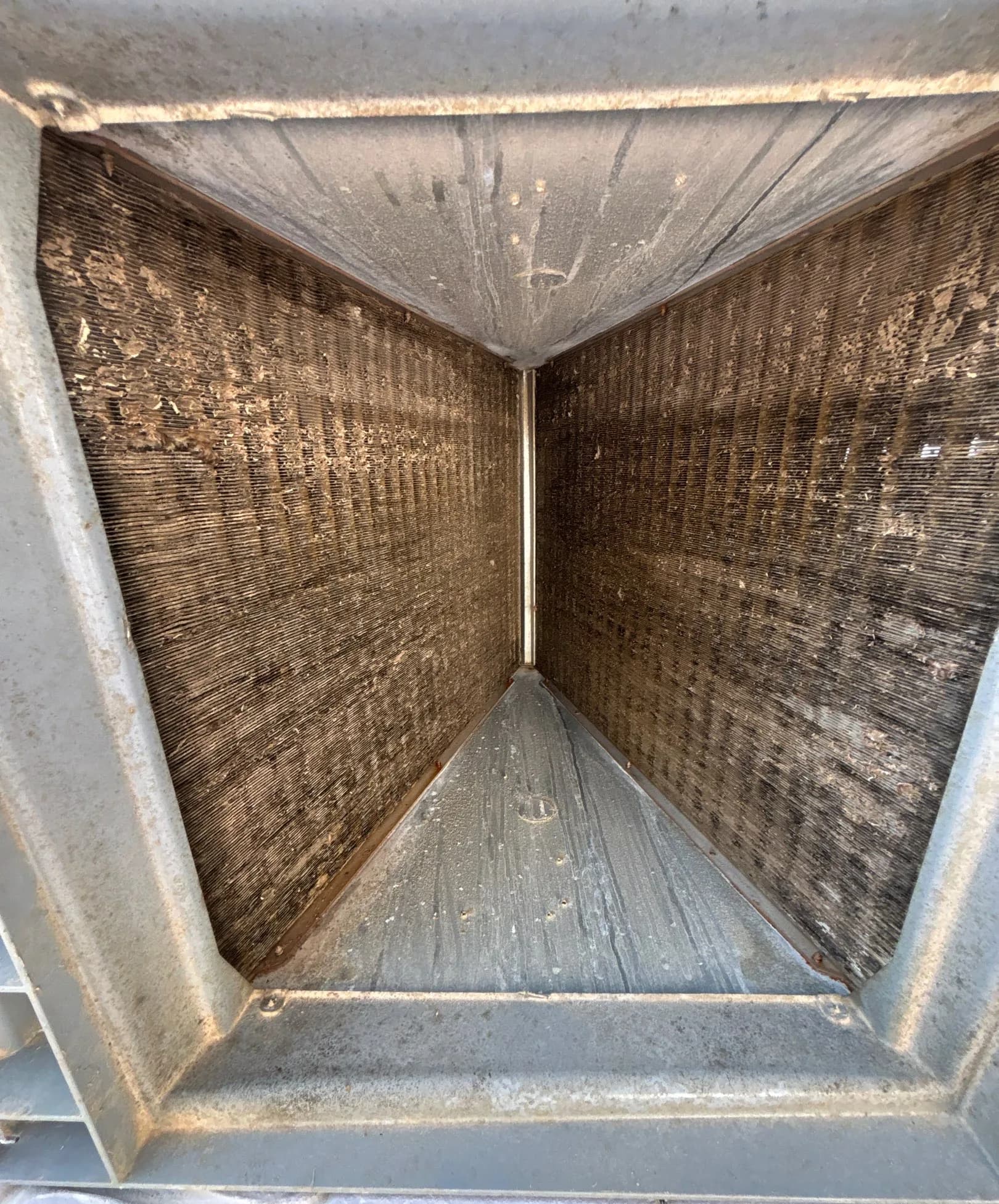 Why Is My AC Dripping Water Into the Garage in Tiki Island?