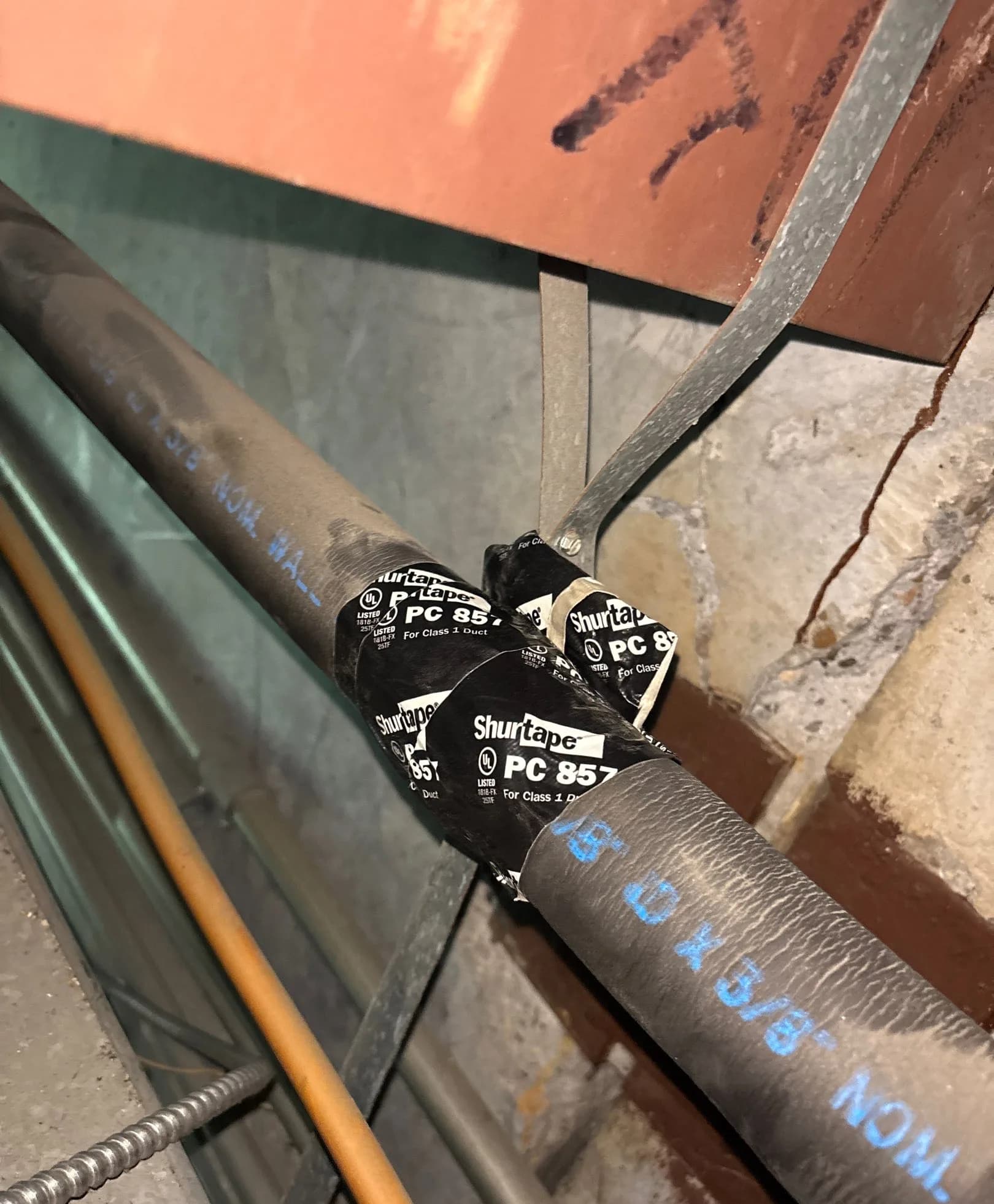 Exposed Refrigerant Lines on a Commercial Roof in Dickinson